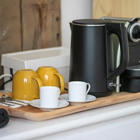 Gazde/Camere de închiriat Cozy Airport *